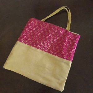 NWOT Beautiful silk like bag w/magenta pink design